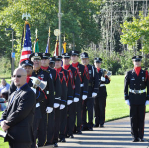 The Tacoma Fire Department hosted a public remembrance ceremony at Marine Park along Ruston Way Wednesday morning to mark the 12th anniversary of the 9/11 tragedy. Guest speakers included Tacoma City Councilmember Robert Thoms and Tacoma Fire Chief James P. Duggan. The event was part of a nationwide salute to firefighters, police officers, emergency medical services workers and civilians whose lives were forever changed on that day. (PHOTO COURTESY TACOMA FIRE DEPARTMENT)