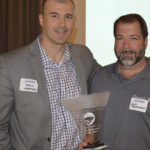 JL Darling’s Jason Landmark and John Mattingly accepted the 12th Annual Tahoma Environmental Business Award from the Tacoma-Pierce County Chamber in 2014. (PHOTO COURTESY TACOMA-PIERCE COUNTY CHAMBER)