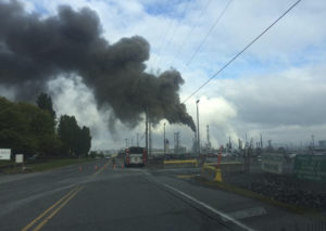 Tacoma fire fighters responded Wednesday morning to reports of a crude oil burning at a refinery located on the Port of Tacoma tide flats. (PHOTO COURTESY TACOMA FIRE DEPARTMENT)