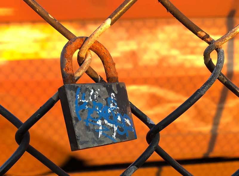 Much resistance to change is about as productive as this lock on a chain link fence. (Photo by Morf Morford)