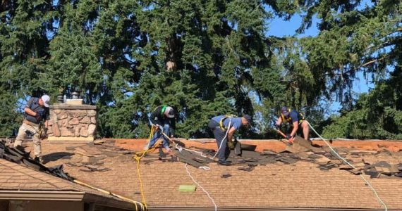 Roofers in training get the job done. (Photo by Morf Morford)