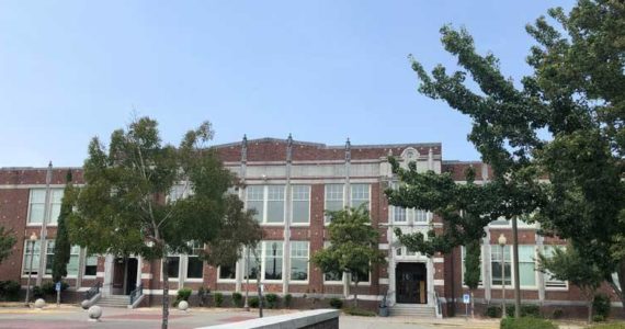 Whatever name it may hold, this school is a prominent part of Tacoma’s landscape and history. (Hilltop Heritage Middle School, the school formerly known as Jason Lee Middle School.) Photo by Morf Morford