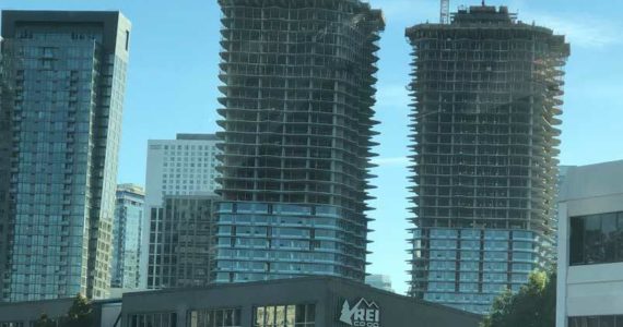 These buildings in downtown Seattle may not have been intended for housing, but sometime in their life-span, they almost certainly will. (Photo by Morf Morford)