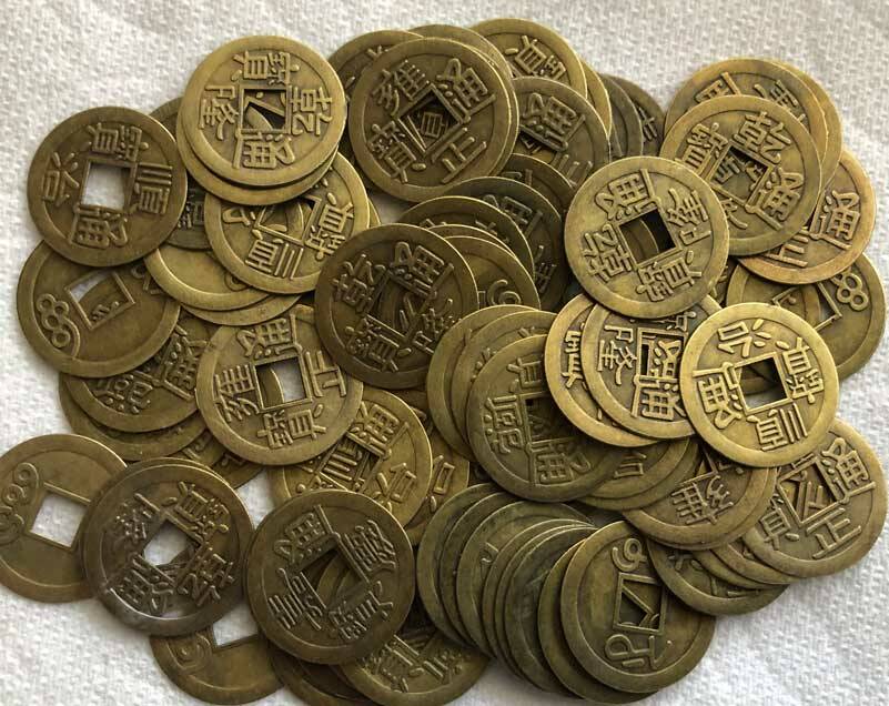 Piles of Chinese coins may - or may not- buy as much as they used to. (Photo by Morf Morford)