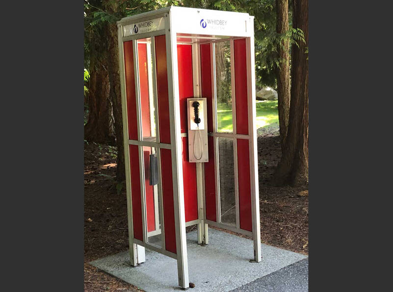 For decades, superheroes and stranded travellers sought refuge here. Standing vigil over the entrance to another era, this phone booth, like other secret passages, leads to distant places, mysteries and long lost secrets. It never pretended to be “smart”. (Photo by Morf Morford)