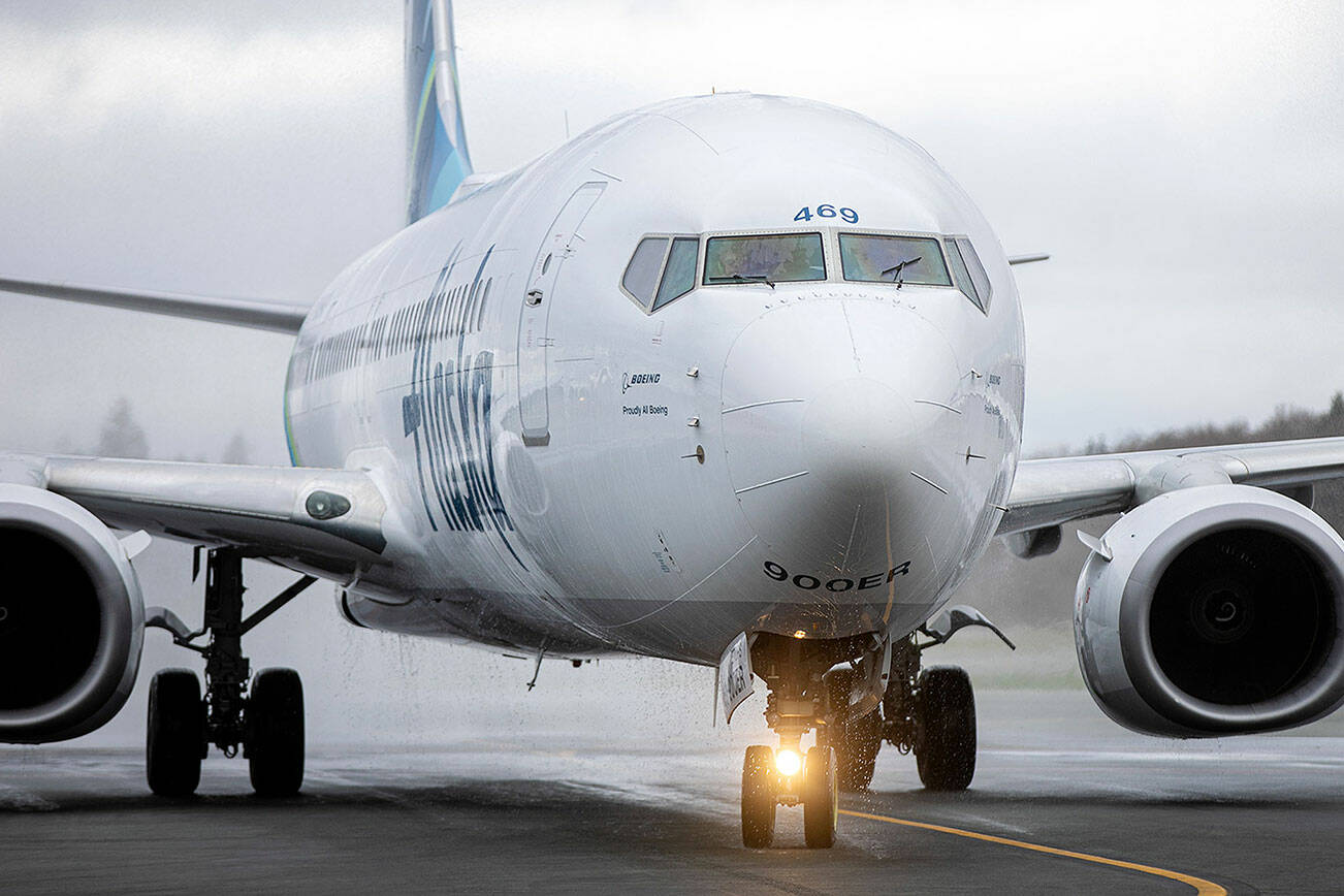 Sound Publishing File Photo
Water drips from an Alaska Airlines Boeing 737 after it received a water salute while becoming the first scheduled 737 arrival Feb. 17, 2022, at Paine Field Airport in Everett, Washington.