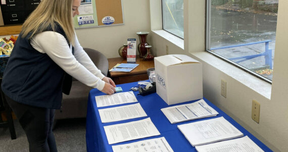 Jerry Cornfield/Washington State Standard
Members of the Washington Public Employees Association are voting on a new two-year contract this week that leaders of the union say they should reject. Aubrei Hansen, WPEA marketing and membership coordinator, is putting out ballots inside the Olympia office on Wednesday Sept. 25, 2024.