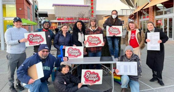 Photo courtesy of Raise the Wage Renton
A group of volunteers from Raise the Wage Renton, shown gathering signatures in 2023. Renton residents approved a higher minimum wage for the city in a Feb. 2024 special election.