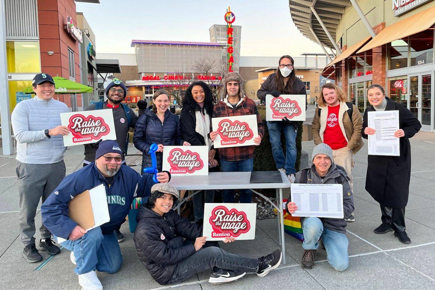 Photo courtesy of Raise the Wage Renton
A group of volunteers from Raise the Wage Renton, shown gathering signatures in 2023. Renton residents approved a higher minimum wage for the city in a Feb. 2024 special election.