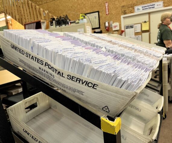 Ballot envelopes sit in the Thurston County elections center. (Laurel Demkovich/Washington State Standard)