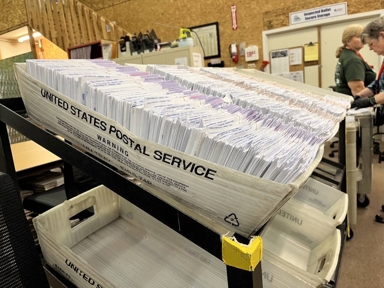 Ballot envelopes sit in the Thurston County elections center. (Laurel Demkovich/Washington State Standard)