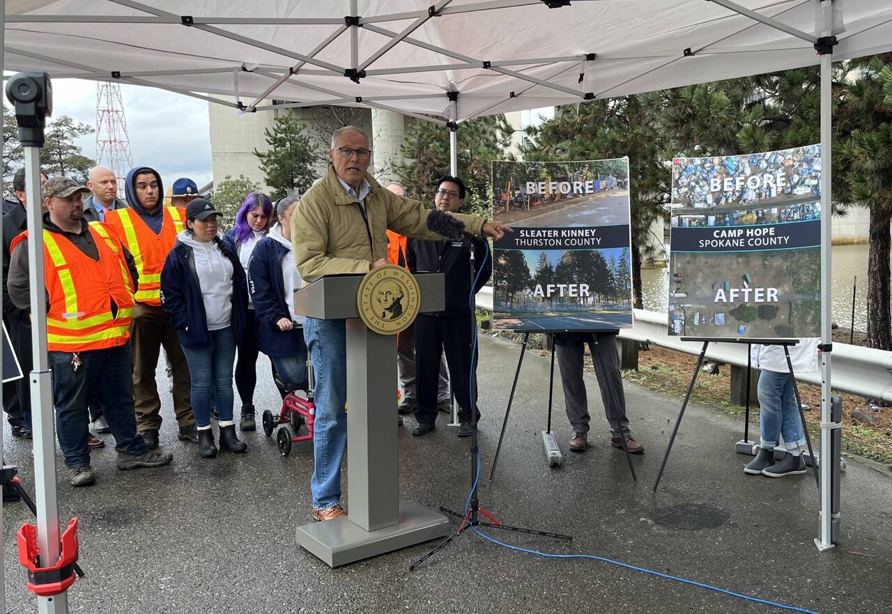 Gov. Jay Inslee released his 2024 budget proposals surrounding housing and homelessness programs at the site of a former encampment in Seattle last December. (Laurel Demkovich/Washington State Standard)