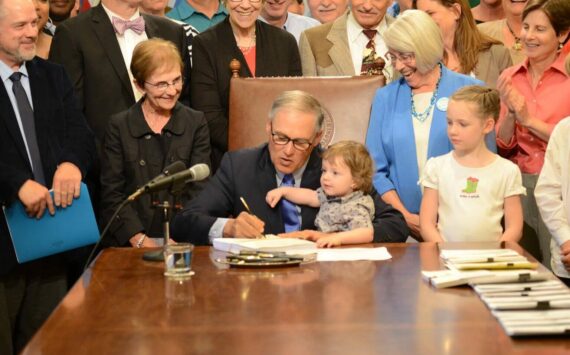 Office of the Governor 
Gov. Jay Inslee signs legislation in 2017 creating the Department of Children, Youth and Families.