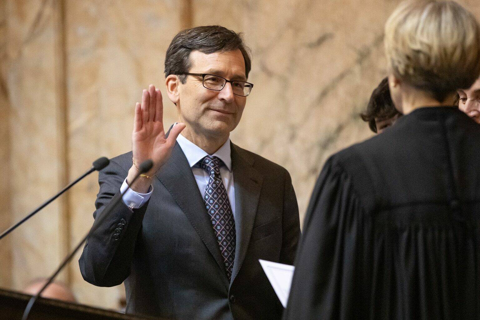 Bob Ferguson is sworn in as the 24th Governor of the State of Washington during his inauguration ceremony Wednesday, Jan. 15, 2025, at the Washington State Capitol in Olympia, Wash. (Ryan Berry/Washington State Standard)