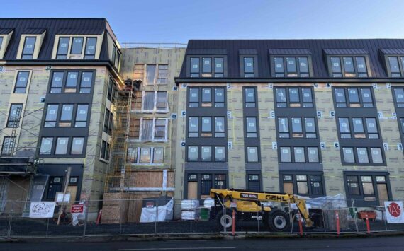 An apartment building construction site in Olympia, Washington in January 2025. (Photo by Bill Lucia/Washington State Standard)